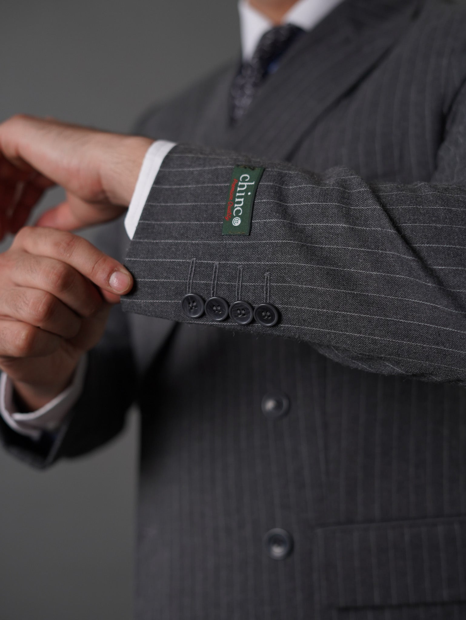 Double breasted suit - gray striped